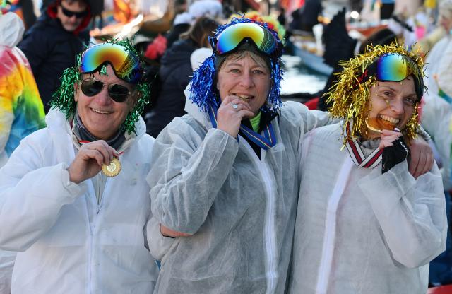 (260202) -- VENICE, Feb. 2, 2026 (Xinhua) -- Revelers dressed up in theme of the Olympic Games pose during the water parade of Venice Carnival in Venice, Italy, Feb. 1, 2026. The 2026 version of the traditional Venice Carnival runs from Jan. 31 to Feb. 17. (Xinhua/Li Jing)