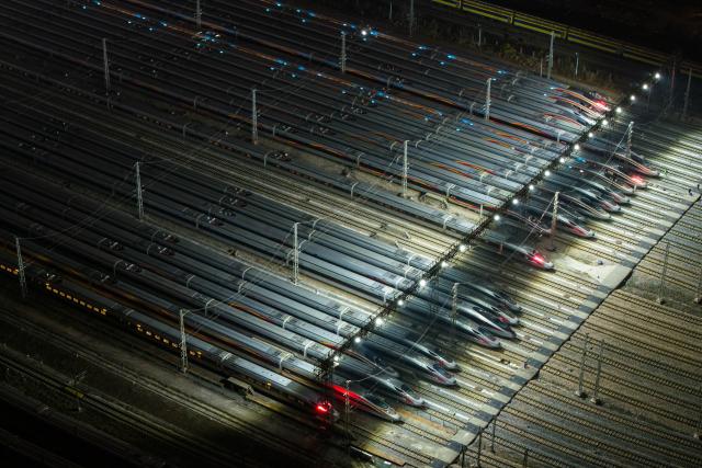 (260202) -- CHANGSHA, Feb. 2, 2026 (Xinhua) -- An aerial drone photo taken on Feb. 2, 2026 shows high-speed trains at a maintenance depot in Changsha, central China's Hunan Province.
  China's annual Spring Festival travel rush began on Monday, with inter-regional trips expected to hit a record 9.5 billion.
  Passenger volumes on railways and civil aviation are forecast at 540 million and 95 million, respectively, with both total traffic and daily peak flows expected to surpass previous records.
  The Spring Festival, or the Chinese New Year, falls on Feb. 17 this year. The official holiday lasts nine days, with the travel rush running through March 13. (Xinhua/Chen Sihan)