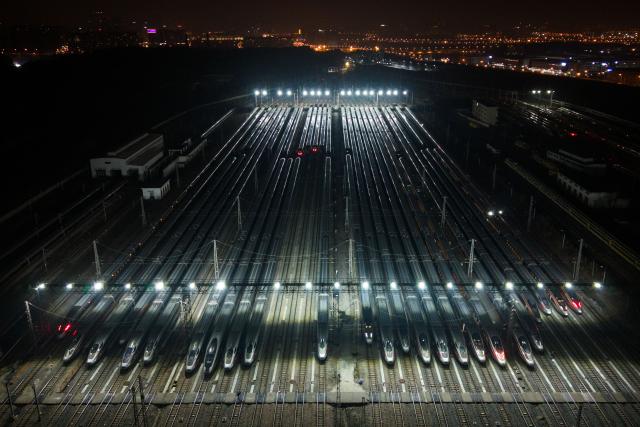 (260202) -- CHANGSHA, Feb. 2, 2026 (Xinhua) -- An aerial drone photo taken on Feb. 2, 2026 shows high-speed trains at a maintenance depot in Changsha, central China's Hunan Province.
  China's annual Spring Festival travel rush began on Monday, with inter-regional trips expected to hit a record 9.5 billion.
  Passenger volumes on railways and civil aviation are forecast at 540 million and 95 million, respectively, with both total traffic and daily peak flows expected to surpass previous records.
  The Spring Festival, or the Chinese New Year, falls on Feb. 17 this year. The official holiday lasts nine days, with the travel rush running through March 13. (Xinhua/Chen Sihan)