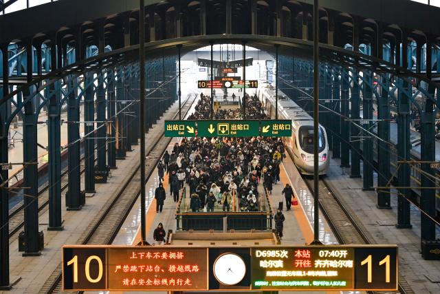 (260202) -- BEIJING, Feb. 2, 2026 (Xinhua) -- Passengers are pictured at a platform of Harbin Railway Station in Harbin, northeast China's Heilongjiang Province, Feb. 2, 2026.
  China ushered in its largest annual population migration on Monday, 15 days ahead of the 2026 Spring Festival, also known as the Chinese New Year.
  A total of 9.5 billion passenger trips are expected during this year's travel rush period that will end on March 13, which will be a historic high.
  Of this total, road trips remain the dominant mode of travel, accounting for approximately 80 percent. 
  An estimated 540 million passenger trips will be handled by the country's railways, while the civil aviation sector will see 95 million trips. Both the overall scale and daily peak traffic of rail and air travel are expected to surpass historic high levels this year.
  In China, the 40-day travel surge will witness hundreds of millions of people return to their hometowns for family reunions. (Photo by Yuan Yong/Xinhua)