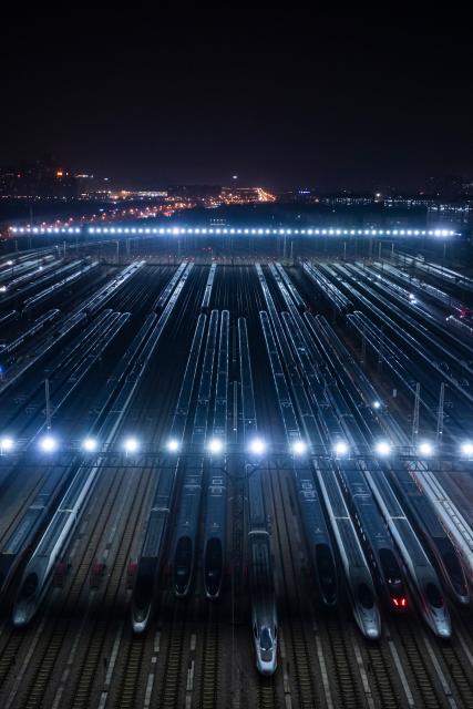 (260202) -- BEIJING, Feb. 2, 2026 (Xinhua) -- An aerial drone photo taken on Feb. 1, 2026 shows high-speed trains at a train depot in Wuhan, central China's Hubei Province.
  China ushered in its largest annual population migration on Monday, 15 days ahead of the 2026 Spring Festival, also known as the Chinese New Year.
  A total of 9.5 billion passenger trips are expected during this year's travel rush period that will end on March 13, which will be a historic high.
  Of this total, road trips remain the dominant mode of travel, accounting for approximately 80 percent. 
  An estimated 540 million passenger trips will be handled by the country's railways, while the civil aviation sector will see 95 million trips. Both the overall scale and daily peak traffic of rail and air travel are expected to surpass historic high levels this year.
  In China, the 40-day travel surge will witness hundreds of millions of people return to their hometowns for family reunions. (Xinhua/Wu Zhizun)