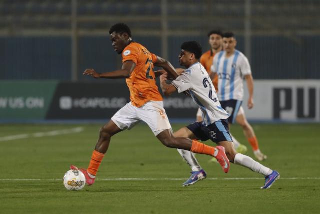 (260202) -- CAIRO, Feb. 2, 2026 (Xinhua) -- RS Berkane's Valere Paul Bassene (L) breaks through during the CAF Champions League Group A match between Pyramids FC of Egypt and RS Berkane of Morocco in Cairo, Egypt, Feb. 1, 2026. (Xinhua/Ahmed Gomaa)