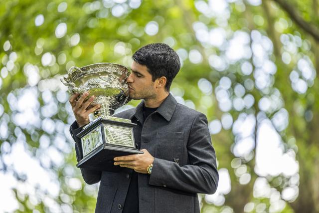 (260202) -- MELBOURNE, Feb. 2, 2026 (Xinhua) -- Carlos Alcaraz of Spain poses with the Norman Brookes Challenge Cup during the 2026 Australian Open men's champion media opportunity at the Royal Exhibition Building in Melbourne, Australia, Feb. 2, 2026. (Photo by Hu Jingchen/Xinhua)