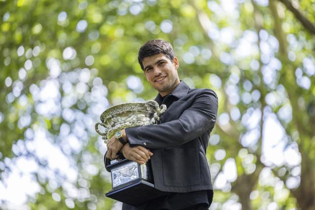 (260202) -- MELBOURNE, Feb. 2, 2026 (Xinhua) -- Carlos Alcaraz of Spain poses with the Norman Brookes Challenge Cup during the 2026 Australian Open men's champion media opportunity at the Royal Exhibition Building in Melbourne, Australia, Feb. 2, 2026. (Photo by Hu Jingchen/Xinhua)