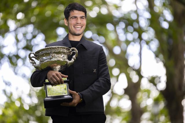 (260202) -- MELBOURNE, Feb. 2, 2026 (Xinhua) -- Carlos Alcaraz of Spain poses with the Norman Brookes Challenge Cup during the 2026 Australian Open men's champion media opportunity at the Royal Exhibition Building in Melbourne, Australia, Feb. 2, 2026. (Photo by Hu Jingchen/Xinhua)