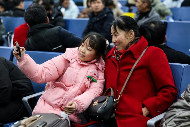 (260202) -- BEIJING, Feb. 2, 2026 (Xinhua) -- Passengers take selfies at Lanzhou Railway Station in northwest China's Gansu Province, Feb. 2, 2026.
  China ushered in its largest annual population migration on Monday, 15 days ahead of the 2026 Spring Festival, also known as the Chinese New Year.
  A total of 9.5 billion passenger trips are expected during this year's travel rush period that will end on March 13, which will be a historic high.
  In China, the 40-day travel surge will witness hundreds of millions of people return to their hometowns for family reunions. (Photo by Hou Chonghui/Xinhua)
