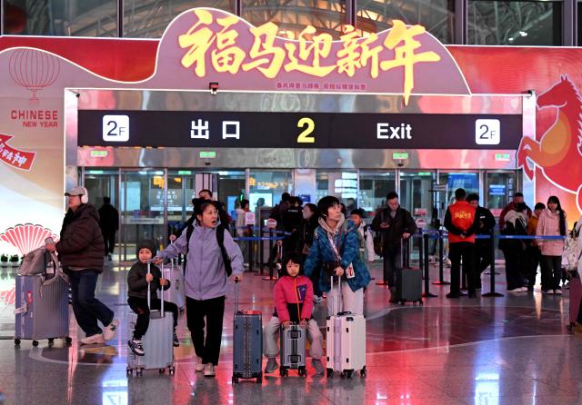 (260202) -- BEIJING, Feb. 2, 2026 (Xinhua) -- Passengers are seen at Shijiazhuang Zhengding International Airport in Shijiazhuang City, north China's Hebei Province, Feb. 2, 2026.
  China ushered in its largest annual population migration on Monday, 15 days ahead of the 2026 Spring Festival, also known as the Chinese New Year.
  A total of 9.5 billion passenger trips are expected during this year's travel rush period that will end on March 13, which will be a historic high.
  In China, the 40-day travel surge will witness hundreds of millions of people return to their hometowns for family reunions. (Photo by Chen Qibao/Xinhua)