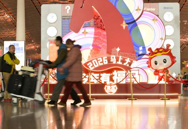 (260202) -- BEIJING, Feb. 2, 2026 (Xinhua) -- Passengers are seen at Beijing Capital International Airport in Beijing, capital of China, Feb. 2, 2026.
  China ushered in its largest annual population migration on Monday, 15 days ahead of the 2026 Spring Festival, also known as the Chinese New Year.
  A total of 9.5 billion passenger trips are expected during this year's travel rush period that will end on March 13, which will be a historic high. (Xinhua/Li He)