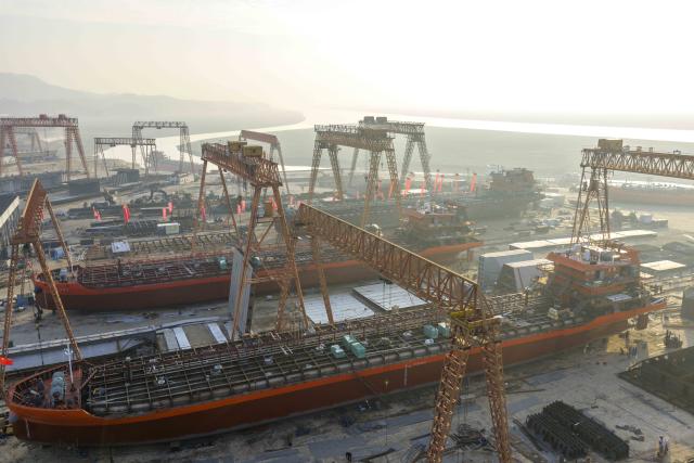 (260202) -- TAIZHOU, Feb. 2, 2026 (Xinhua) -- An aerial drone photo taken on Jan. 3, 2026 shows a shipbuilding site of Duchang Shipyard Co., Ltd. in Jiujiang, east China's Jiangxi Province. China's shipbuilding industry maintained the world's largest market share in terms of three major indicators for the 16th consecutive year in 2025, according to data released by the Ministry of Industry and Information Technology on Sunday.
   The country's shipbuilding output reached 53.69 million deadweight tonnes (DWT) in 2025, up 11.4 percent year on year and accounting for 56.1 percent of the global total.
   New orders reached 107.82 million DWT last year, representing a 69 percent share of the global market.
   As of the end of December 2025, the sector's holding orders stood at 274.42 million DWT, up 31.5 percent from the previous year. This volume accounted for 66.8 percent of the global market share. (Photo by Fu Jianbin/Xinhua)