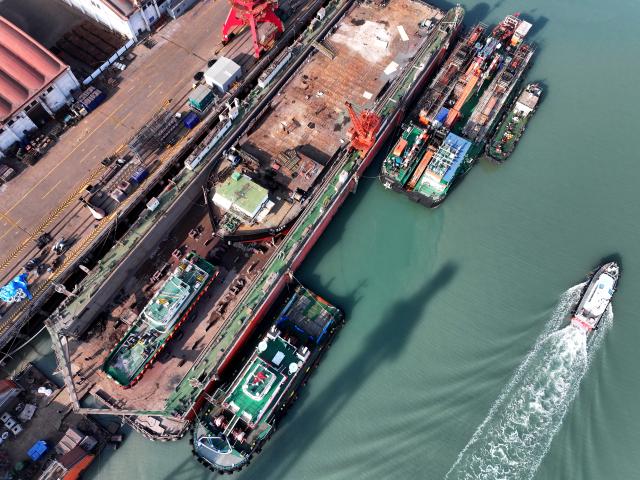 (260202) -- TAIZHOU, Feb. 2, 2026 (Xinhua) -- A drone photo shows ships under construction at a shipbuilding base in Lianyungang, east China's Jiangsu Province, Feb. 2, 2026. China's shipbuilding industry maintained the world's largest market share in terms of three major indicators for the 16th consecutive year in 2025, according to data released by the Ministry of Industry and Information Technology on Sunday.
   The country's shipbuilding output reached 53.69 million deadweight tonnes (DWT) in 2025, up 11.4 percent year on year and accounting for 56.1 percent of the global total.
   New orders reached 107.82 million DWT last year, representing a 69 percent share of the global market.
   As of the end of December 2025, the sector's holding orders stood at 274.42 million DWT, up 31.5 percent from the previous year. This volume accounted for 66.8 percent of the global market share. (Photo by Wang Chun/Xinhua)