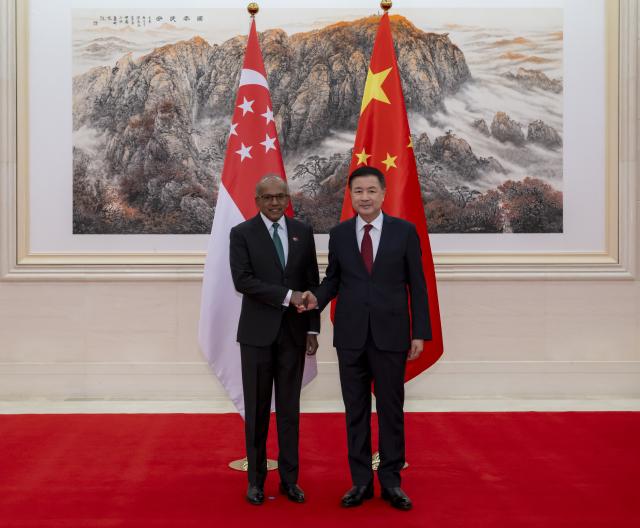 (260202) -- BEIJING, Feb. 2, 2026 (Xinhua) -- Chinese State Councilor and Minister of Public Security Wang Xiaohong meets with Singaporean Coordinating Minister for National Security and Minister for Home Affairs Kasiviswanathan Shanmugam in Beijing, capital of China, Feb. 2, 2026. (Xinhua/Zhai Jianlan)