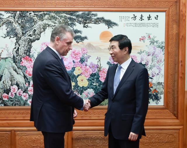 (260202) -- BEIJING, Feb. 2, 2026 (Xinhua) -- Wang Huning, a member of the Standing Committee of the Political Bureau of the Communist Party of China Central Committee and chairman of the Chinese People's Political Consultative Conference National Committee, meets with a delegation from the Liberal Democratic Party of Russia, headed by its chairman Leonid Slutsky, in Beijing, capital of China, Feb. 2, 2026. (Xinhua/Wang Ye)