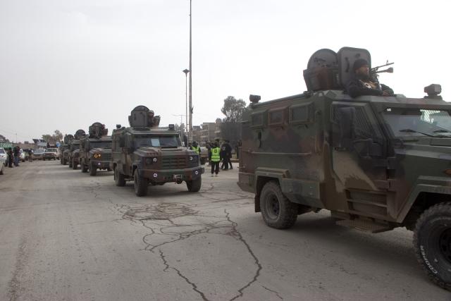 (260202) -- HASAKAH, Feb. 2, 2026 (Xinhua) -- Syrian internal security forces enter Hasakah city, northeastern Syria, on Feb. 2, 2026. Syrian internal security forces on Monday entered Hasakah city as part of a recently-reached agreement between the Syrian interim government and the Kurdish-led Syrian Democratic Forces (SDF), marking a significant step toward easing tensions in northeastern Syria and restoring state authority to key urban centers. (Str/Xinhua)