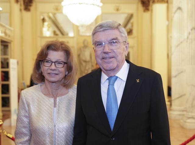(260202) -- MILAN, Feb. 2, 2026 (Xinhua) -- Former IOC president Thomas Bach (R) and his wife Claudia Bach arrive for the opening ceremony of the 145th IOC Session at La Scala Theatre in Milan, Italy on Feb. 2, 2026. (Xinhua/Sun Fei)