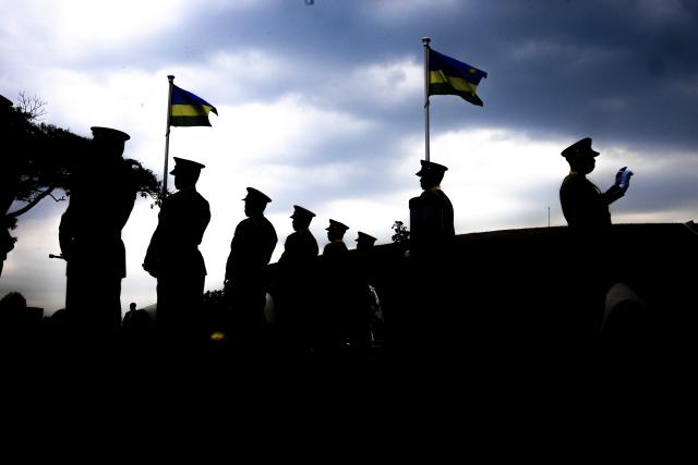 (260203) -- BEIJING, Feb. 3, 2026 (Xinhua) -- A military band performs during the 32nd National Heroes' Day commemoration at the National Heroes Mausoleum in Remera Sector, Gasabo District of Kigali, Rwanda, Feb. 1, 2026. (Photo by Cyril Ndegeya/Xinhua)