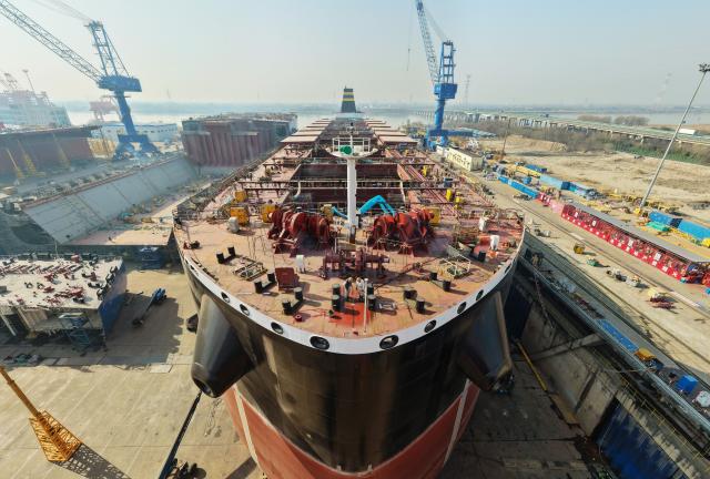 (260203) -- BEIJING, Feb. 3, 2026 (Xinhua) -- A drone photo taken on Jan. 13, 2026 shows a ship under construction at a factory of Cosco Shipping Heavy Industry (Yangzhou) Co., Ltd. in Yangzhou, east China's Jiangsu Province.
  China's shipbuilding industry maintained the world's largest market share in terms of three major indicators for the 16th consecutive year in 2025, according to data released by the Ministry of Industry and Information Technology on Sunday.
  The country's shipbuilding output reached 53.69 million deadweight tonnes (DWT) in 2025, up 11.4 percent year on year and accounting for 56.1 percent of the global total.
  New orders reached 107.82 million DWT last year, representing a 69 percent share of the global market.
  As of the end of December 2025, the sector's holding orders stood at 274.42 million DWT, up 31.5 percent from the previous year. This volume accounted for 66.8 percent of the global market share. (Photo by Meng Delong/Xinhua)
