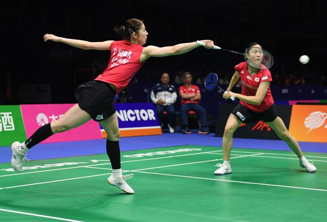 (260203) -- QINGDAO, Feb. 3, 2026 (Xinhua) -- Nakanishi Kie/Shida Chiharu (L) of Japan compete during the women's doubles match against Yeung Nga Ting/Yeung Pui Lam of China's Hong Kong during the Group X match between Japan and China's Hong Kong at Badminton Asia Team Championships 2026 in Qingdao, east China's Shandong Province, Feb. 3, 2026. (Xinhua/Li Ziheng)