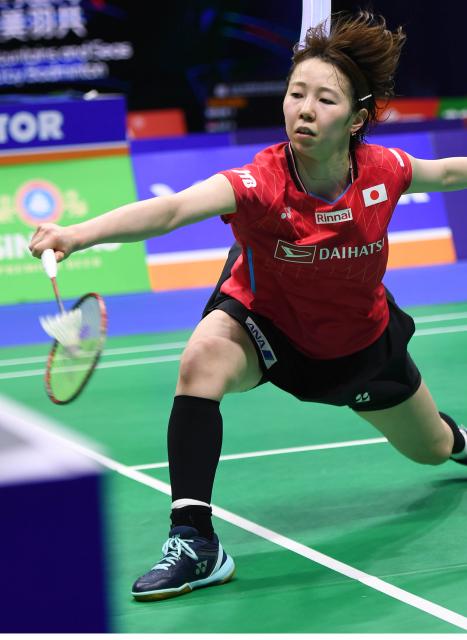 (260203) -- QINGDAO, Feb. 3, 2026 (Xinhua) -- Gunji Riko of Japan competes in the women's singles match against Saloni Samirbhai Mehta of China's Hong Kong during the Group X match between Japan and China's Hong Kong at Badminton Asia Team Championships 2026 in Qingdao, east China's Shandong Province, Feb. 3, 2026. (Xinhua/Li Ziheng)