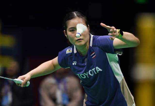 (260203) -- QINGDAO, Feb. 3, 2026 (Xinhua) -- Busanan Ongbamrunghan of Thailand competes in the women's singles match against Thet Htar Thuzar of Myanmar during the Group Y match between Thailand and Myanmar at Badminton Asia Team Championships 2026 in Qingdao, east China's Shandong Province, Feb. 3, 2026. (Xinhua/Li Ziheng)