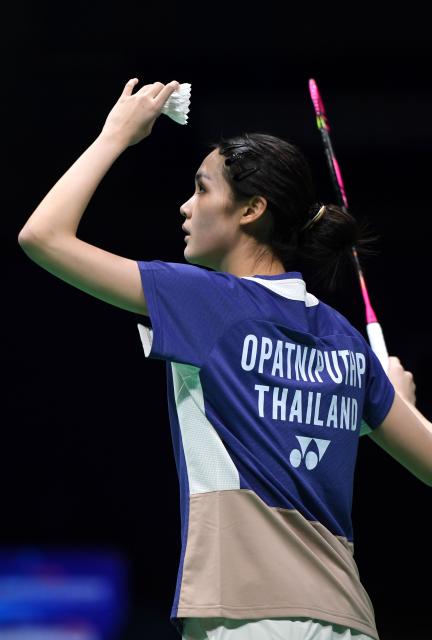 (260203) -- QINGDAO, Feb. 3, 2026 (Xinhua) -- Pitchamon Opatniputh of Thailand hits a return in the women's singles match against Eaint Chit Phoo of Myanmar during the Group Y match between Thailand and Myanmar at Badminton Asia Team Championships 2026 in Qingdao, east China's Shandong Province, Feb. 3, 2026. (Xinhua/Li Ziheng)