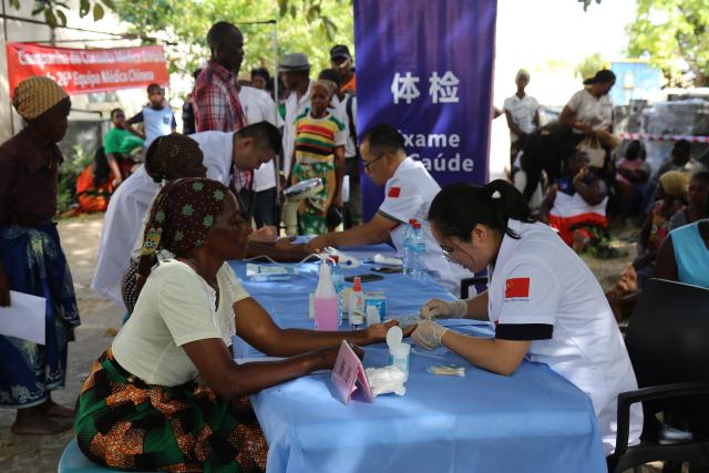 (260203) -- MAPUTO, Feb. 3, 2026 (Xinhua) -- Doctors from the 26th Chinese medical team to Mozambique provide free medical services on Inhaca Island in Maputo, on Feb. 1, 2026. Chinese doctors provided free consultations and donated medical supplies on Inhaca Island in Maputo, the Mozambican capital, over the weekend.
   The activity by the 26th Chinese medical team to Mozambique, in collaboration with China Road and Bridge Corporation, focused on the diagnosis and treatment of common conditions like wounds, eye diseases, hypertension, diabetes and various types of pain, benefiting about 240 patients.
   TO GO WITH "Chinese medical team provides free medical services, donates supplies on Inhaca Island in Mozambique" (Xinhua/Leng Ruijie)