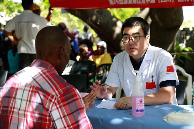 (260203) -- MAPUTO, Feb. 3, 2026 (Xinhua) -- A doctor from the 26th Chinese medical team to Mozambique provides free medical service on Inhaca Island in Maputo, on Feb. 1, 2026. Chinese doctors provided free consultations and donated medical supplies on Inhaca Island in Maputo, the Mozambican capital, over the weekend.
   The activity by the 26th Chinese medical team to Mozambique, in collaboration with China Road and Bridge Corporation, focused on the diagnosis and treatment of common conditions like wounds, eye diseases, hypertension, diabetes and various types of pain, benefiting about 240 patients.
   TO GO WITH "Chinese medical team provides free medical services, donates supplies on Inhaca Island in Mozambique" (Xinhua/Leng Ruijie)