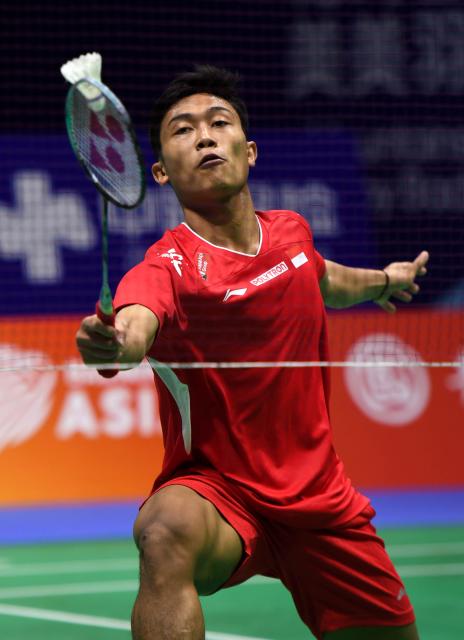 (260203) -- QINGDAO, Feb. 3, 2026 (Xinhua) -- Prahdiska Bagas Shujiwo of Indonesia hits a return in the men's singles match against Hein Htut of Myanmar during the men's team group D match between Indonesia and Myanmar at Badminton Asia Team Championships 2026 in Qingdao, east China's Shandong Province, Feb. 3, 2026. (Xinhua/Li Ziheng)