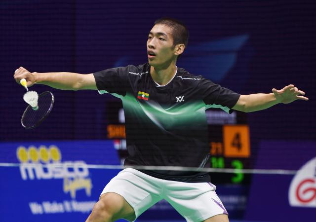 (260203) -- QINGDAO, Feb. 3, 2026 (Xinhua) -- Hein Htut of Myanmar hits a return during the men's singles match against Prahdiska Bagas Shujiwo of Indonesia during the men's team group D match between Indonesia and Myanmar at Badminton Asia Team Championships 2026 in Qingdao, east China's Shandong Province, Feb. 3, 2026. (Xinhua/Li Ziheng)