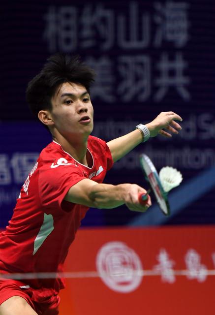 (260203) -- QINGDAO, Feb. 3, 2026 (Xinhua) -- Richie Duta Richardo of Indonesia hits a return in the men's singles match against Lal Zuidika of Myanmar during the men's team group D match between Indonesia and Myanmar at Badminton Asia Team Championships 2026 in Qingdao, east China's Shandong Province, Feb. 3, 2026. (Xinhua/Li Ziheng)
