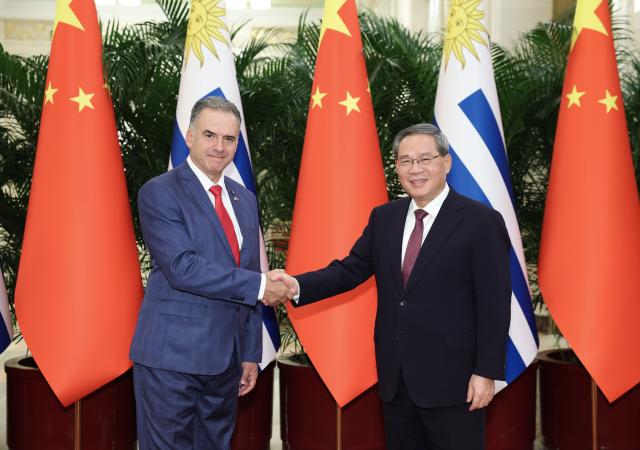 (260203) -- BEIJING, Feb. 3, 2026 (Xinhua) -- Chinese Premier Li Qiang meets with President of the Oriental Republic of Uruguay Yamandu Orsi at the Great Hall of the People in Beijing, capital of China, Feb. 3, 2026. (Xinhua/Huang Jingwen)