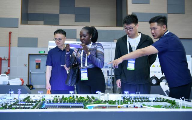 (260203) -- NAIROBI, Feb. 3, 2026 (Xinhua) -- Chinese exhibitors present their products to guests at the booth during the Intersolar Africa 2026 in Nairobi, Kenya, Feb. 3, 2026. TO GO WITH "Africa solar expo opens in Kenya to advance green transition" (Xinhua/Liu Qiong)