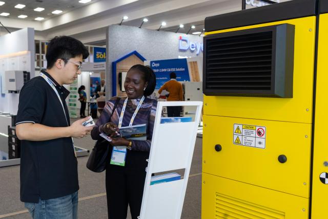 (260203) -- NAIROBI, Feb. 3, 2026 (Xinhua) -- A visitor learns about products at the booth of Sicon Chat Union Electric Co., Ltd. during the Intersolar Africa 2026 in Nairobi, Kenya, Feb. 3, 2026. TO GO WITH "Africa solar expo opens in Kenya to advance green transition" (Xinhua/Xie Jianfei)