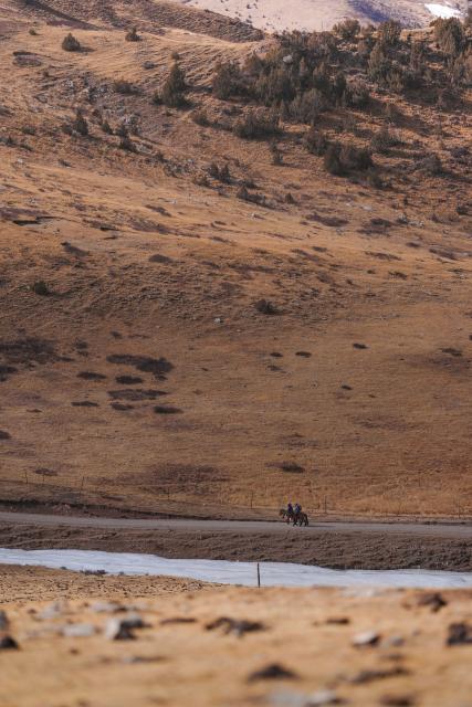 (260203) -- YUSHU, Feb. 3, 2026 (Xinhua) -- Tseten (L) and Kunga patrol in Angsai Township of Zaduo County, Yushu Tibetan Autonomous Prefecture, northwest China's Qinghai Province, Jan. 29, 2026. Amid snow-capped mountains and deep valleys in Angsai Township of Zaduo County, an area in Sanjiangyuan National Park, Tseten and Kunga trek over ridges, cross alpine meadows and carry out ecological patrols, pressing the shutter as they move through the landscape.    
   In 2016, Tseten and Kunga became rangers under a public welfare program. Having taught themselves photography, they have been documenting the mountains, rivers and wildlife of their homeland with their cameras while patrolling, collecting litter, monitoring water sources and observing vegetation. 
   Over a decade, their footprints have spread across the grasslands and river shores. Their lens have remained fixed on the changes unfolding on this land: wildlife populations are increasing, traces of garbage on the grasslands have largely disappeared, and the ecological landscape along the Lancang River has grown better and better. (Xinhua/Qi Zhiyue)