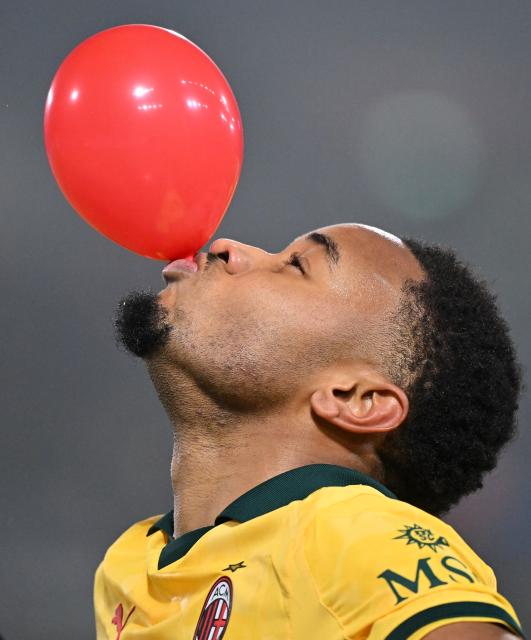 (260204) -- BOLOGNA, Feb. 4, 2026 (Xinhua) -- AC Milan's Christopher Nkunku celebrates his goal during a Serie A football match between Bologna and AC Milan in Bologna, Italy, Feb. 3, 2026. (Photo by Alberto Lingria/Xinhua)