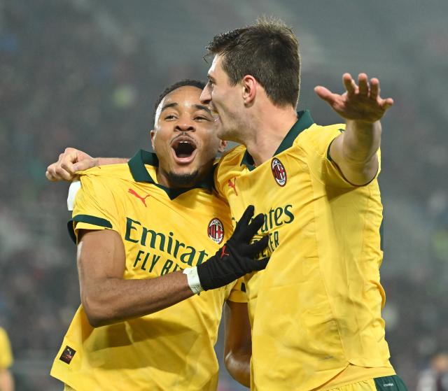 (260204) -- BOLOGNA, Feb. 4, 2026 (Xinhua) -- AC Milan's Christopher Nkunku (L) celebrates his goal with his teammate Matteo Gabbia during a Serie A football match between Bologna and AC Milan in Bologna, Italy, Feb. 3, 2026. (Photo by Alberto Lingria/Xinhua)