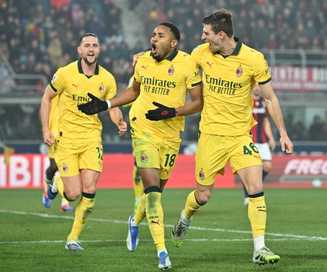 (260204) -- BOLOGNA, Feb. 4, 2026 (Xinhua) -- AC Milan's Christopher Nkunku (C) celebrates his goal with his teammate Matteo Gabbia (R) during a Serie A football match between Bologna and AC Milan in Bologna, Italy, Feb. 3, 2026. (Photo by Alberto Lingria/Xinhua)