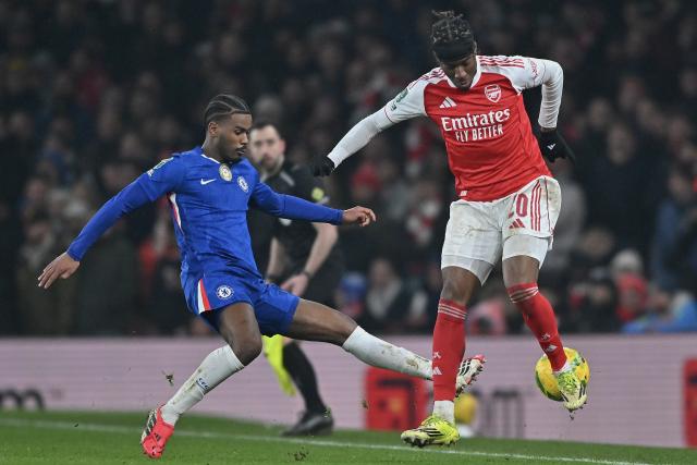 (260204) -- LONDON, Feb. 4, 2026 (Xinhua) -- Noni Madueke (R) of Arsenal battles with Jorrel Hato of Chelsea during the English Football League Cup semifinal second leg match between Arsenal and Chelsea in London, Britain, Feb. 3, 2026. (Xinhua)
FOR EDITORIAL USE ONLY. NOT FOR SALE FOR MARKETING OR ADVERTISING CAMPAIGNS. NO USE WITH UNAUTHORIZED AUDIO, VIDEO, DATA, FIXTURE LISTS, CLUB/LEAGUE LOGOS OR "LIVE" SERVICES. ONLINE IN-MATCH USE LIMITED TO 45 IMAGES, NO VIDEO EMULATION. NO USE IN BETTING, GAMES OR SINGLE CLUB/LEAGUE/PLAYER PUBLICATIONS.