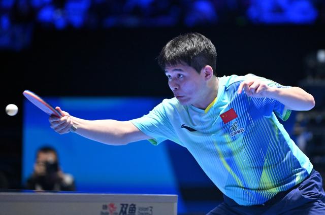 (260204) -- HAIKOU, Feb. 4, 2026 (Xinhua) -- Lin Shidong hits a return during the men's singles group match between Lin Shidong of China and Snehit Suravajjula of India at the ITTF-ATTU Asian Cup Haikou 2025 table tennis tournament in Haikou, south China's Hainan Province, Feb. 4, 2026. (Xinhua/Guo Cheng)