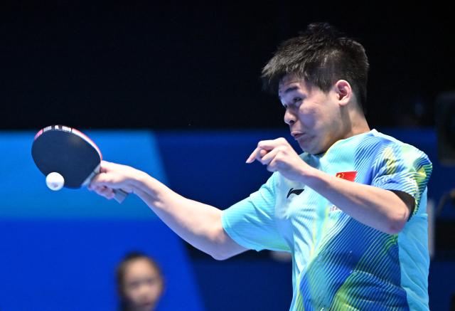 (260204) -- HAIKOU, Feb. 4, 2026 (Xinhua) -- Lin Shidong hits a return during the men's singles group match between Lin Shidong of China and Snehit Suravajjula of India at the ITTF-ATTU Asian Cup Haikou 2025 table tennis tournament in Haikou, south China's Hainan Province, Feb. 4, 2026. (Xinhua/Guo Cheng)