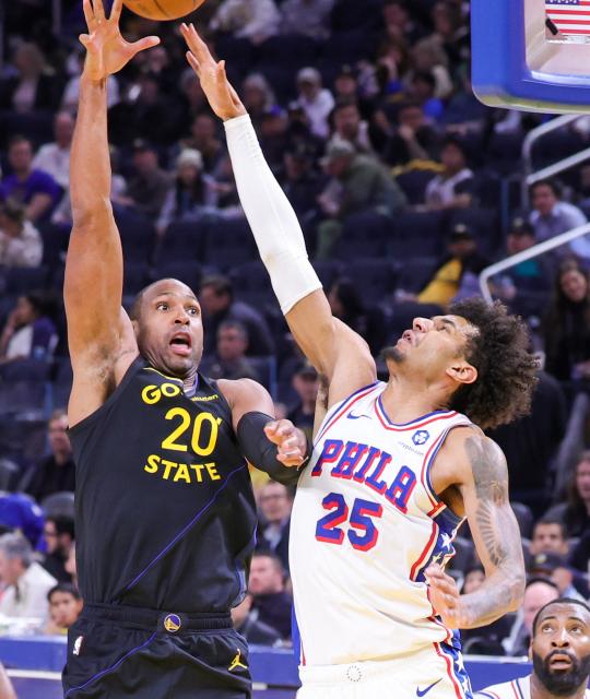 (260204) -- SAN FRANCISCO, Feb. 4, 2026 (Xinhua) -- Al Horford (L) of Golden State Warriors competes during the 2025-2026 NBA regular season basketball game between Golden State Warriors and Philadelphia 76ers in San Francisco, the United States, Feb. 3, 2026. (Photo by Arthur Dong/Xinhua)