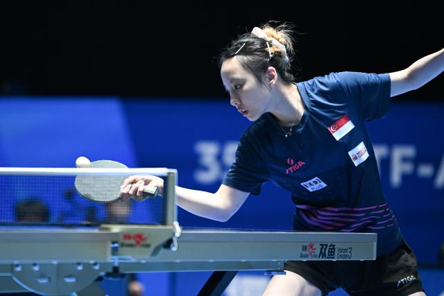 (260204) -- HAIKOU, Feb. 4, 2026 (Xinhua) -- Ser Lin Qian hits a return during the women's singles group match between Wang Yidi of China and Ser Lin Qian of Singapore at the ITTF-ATTU Asian Cup Haikou 2025 table tennis tournament in Haikou, south China's Hainan Province, Feb. 4, 2026. (Xinhua/Pu Xiaoxu)