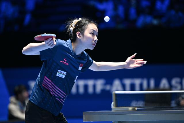 (260204) -- HAIKOU, Feb. 4, 2026 (Xinhua) -- Ser Lin Qian serves during the women's singles group match between Wang Yidi of China and Ser Lin Qian of Singapore at the ITTF-ATTU Asian Cup Haikou 2025 table tennis tournament in Haikou, south China's Hainan Province, Feb. 4, 2026. (Xinhua/Pu Xiaoxu)