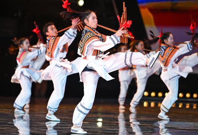 (260204) -- TAIJIANG, Feb. 4, 2026 (Xinhua) -- Children perform Lusheng Dance during a "village gala" in Taipan Village of Taijiang County, southwest China's Guizhou Province, Feb. 3, 2026.
  A "village gala" was held at the court of the "Village Basketball Association (Village BA)" in Taijiang County Tuesday night, which featured various folk performances staged by local villagers. 
  "Village Basketball Association" or "Village BA", is a grassroot basketball tournament held in Taipan Village. Organized by local residents, this event has gained popularity over the years and draws a large crowd of spectators and participants alike. (Xinhua/Yang Wenbin)