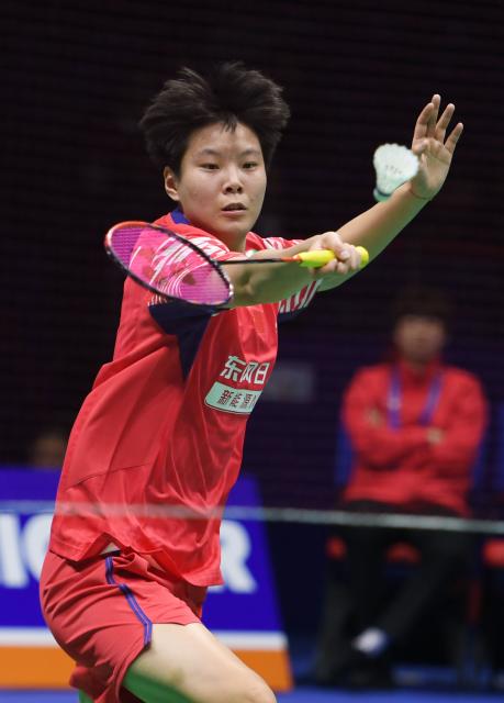 (260204) -- QINGDAO, Feb. 4, 2026 (Xinhua) -- Xu Wenjing of China hits a return in the women's singles match against Wong Ling Ching of Malaysia during the women's team Group W match between China and Malaysia at Badminton Asia Team Championships 2026 in Qingdao, east China's Shandong Province, Feb. 4, 2026. (Xinhua/Li Ziheng)