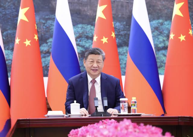 (260204) -- BEIJING, Feb. 4, 2026 (Xinhua) -- Chinese President Xi Jinping holds a virtual meeting with Russian President Vladimir Putin at the Great Hall of the People in Beijing, capital of China, Feb. 4, 2026. (Xinhua/Huang Jingwen)