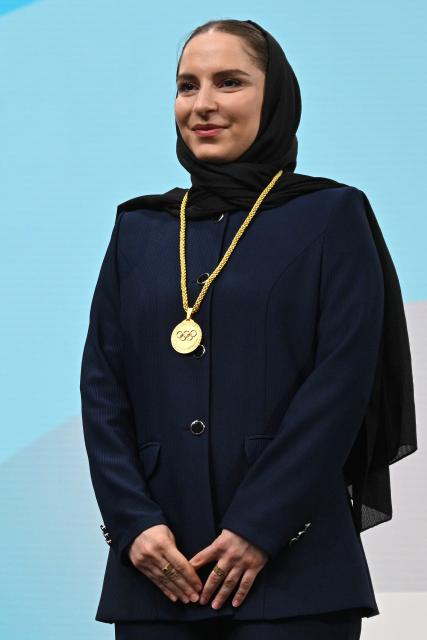 (260204) -- MILAN, Feb. 4, 2026 (Xinhua) -- Iranian badminton player Soraya Aghaei Hajiagha attends her oath ceremony as the newly appointed member of International Olympic Committee (IOC) during the 145th IOC session ahead of the 2026 Milan-Cortina Winter Olympic Games, in Milan, Italy, Feb. 4, 2026. (Daniel Munoz/POOL xia Xinhua)