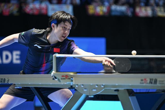 (260204) -- HAIKOU, Feb. 4, 2026 (Xinhua) -- Wang Chuqin hits a return during the men's singles group match between Wang Chuqin of China and Akash Pal of India at the ITTF-ATTU Asian Cup Haikou 2026 table tennis tournament in Haikou, south China's Hainan Province, Feb. 4, 2026. (Xinhua/Pu Xiaoxu)