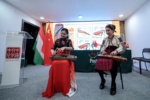 (260204) -- BUDAPEST, Feb. 4, 2026 (Xinhua) -- Artists perform with traditional Chinese and Hungarian instruments at a launch ceremony of the "National Treasures: Traditional Hungarian and Chinese Instruments" stamps in Budapest, Hungary, on Feb. 4, 2026. Hungary and China on Wednesday jointly issued a commemorative stamp series titled "National Treasures: Traditional Hungarian and Chinese Instruments" for the upcoming Chinese New Year. (Photo by David Balogh/Xinhua)