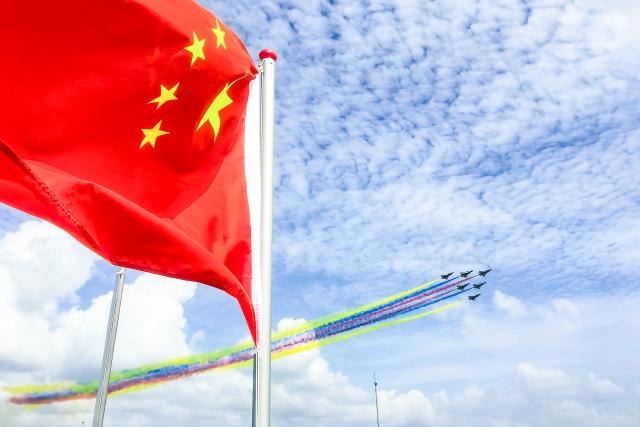 (260204) -- SINGAPORE, Feb. 4, 2026 (Xinhua) -- Aircraft of the Bayi Aerobatic Team of the Chinese People's Liberation Army (PLA) Air Force perform during the 10th Singapore Airshow in Singapore, Feb. 4, 2026. The 10th Singapore Airshow opened on Tuesday at the Changi Exhibition Center. The airshow runs until Feb. 8, with the Bayi Aerobatic Team of the Chinese People's Liberation Army (PLA) Air Force delivering flight displays. (Photo by Zhu Jianghai/Xinhua)