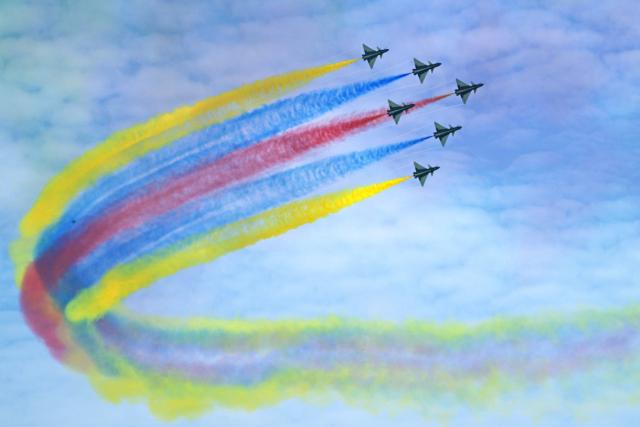 (260204) -- SINGAPORE, Feb. 4, 2026 (Xinhua) -- Aircraft of the Bayi Aerobatic Team of the Chinese People's Liberation Army (PLA) Air Force perform during the 10th Singapore Airshow in Singapore, Feb. 4, 2026. The 10th Singapore Airshow opened on Tuesday at the Changi Exhibition Center. The airshow runs until Feb. 8, with the Bayi Aerobatic Team of the Chinese People's Liberation Army (PLA) Air Force delivering flight displays. (Photo by Then Chih Wey/Xinhua)